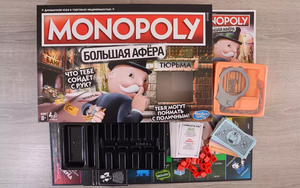 Настольная игра Монополия Большая Афера от Sovabooks, стратегическая игра для всей семьи, изображение коробки и игровых элементов