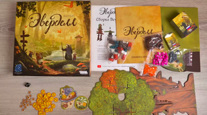 Настольная игра Эверделл от Sovabooks, семейная настольная игра для всех возрастов, изображение коробки и компонентов игры.