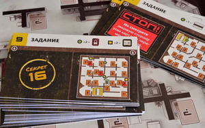 Настольная игра Инициатива от Sovabooks, развивающая стратегию и командную работу, на игровом столе с карточками и фишками