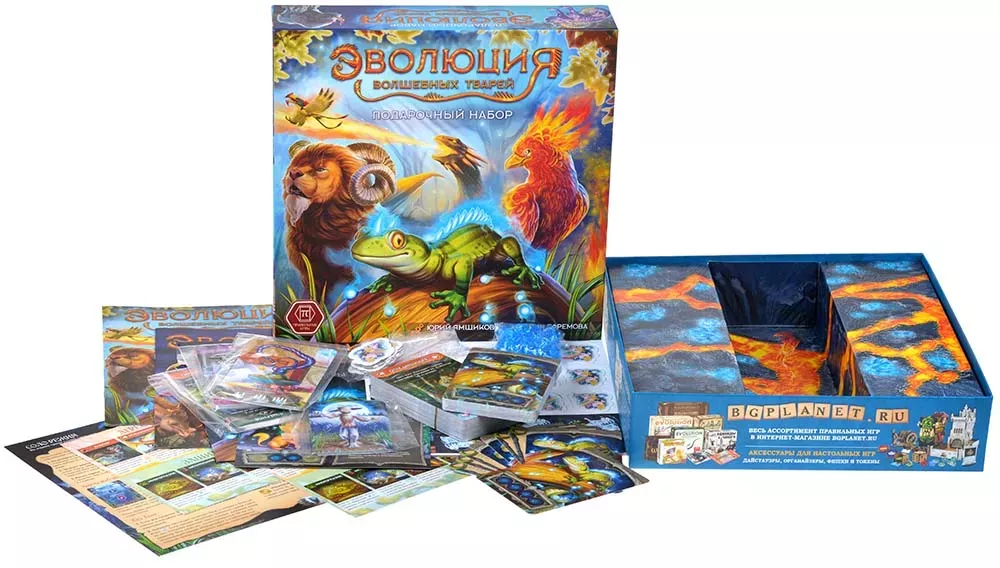 Tabletop game "Evolution of Magical Creatures" by SOVABOOKS, featuring colorful cards and game components on a white background.