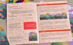 Настольная игра Языколомище от Sovabooks для семейных развлечений, изображение коробки и игрового поля.