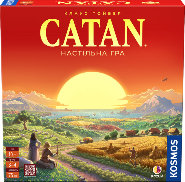 Настільна гра "CATAN" для стратегической игры, изображена коробка с названием и иллюстрациями на передней панели.