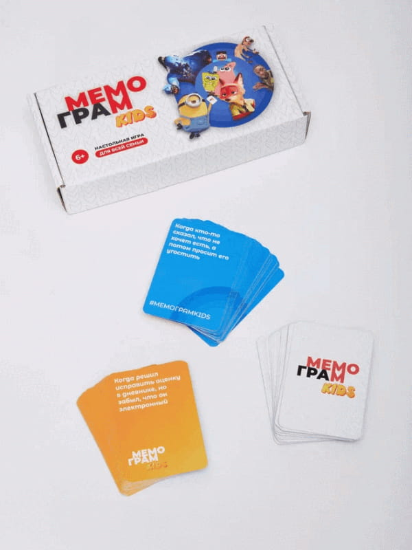Настольная игра Мемограм KIDS от SOVABOOKS, красочная игра для детей, изображение коробки и компонентов.