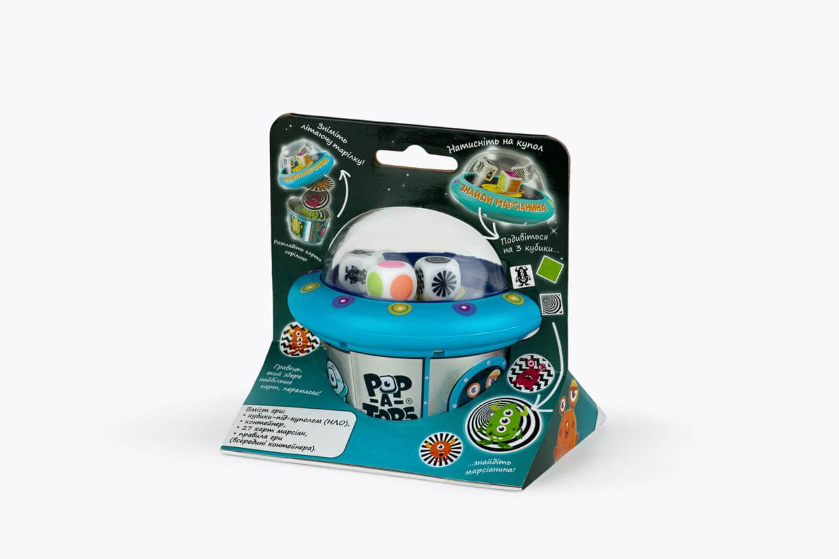 Настольная игра Pop-A-Tops: Знайди марсіанина от SOVABOOKS для детей, изображение коробки с цветными карточками и марсіанином