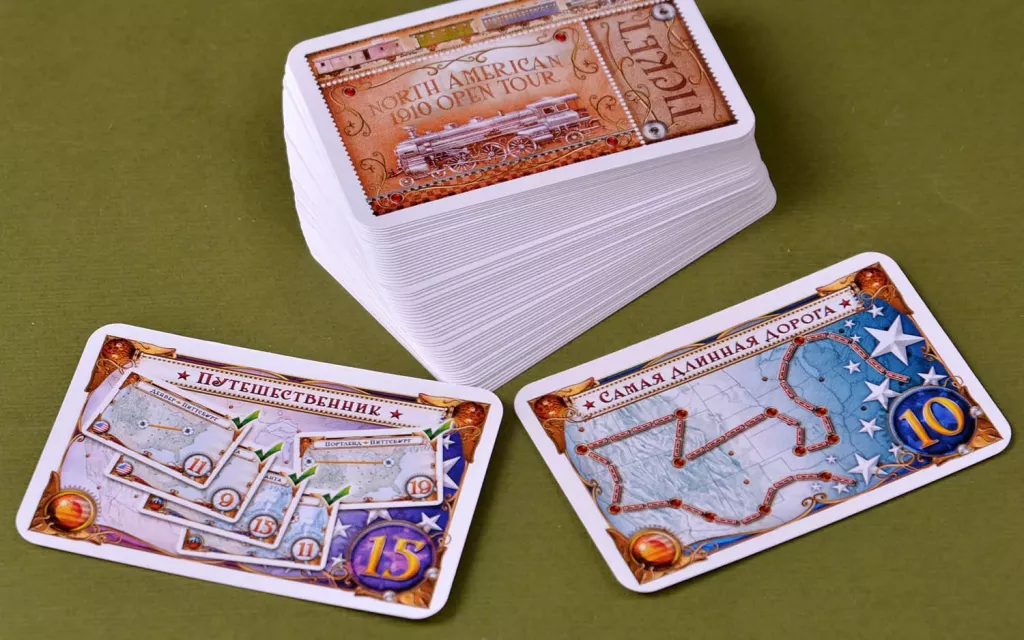 Расширение Ticket to Ride: Америка 1910 для настольной игры от SOVABOOKS, изображение коробки и игровых элементов