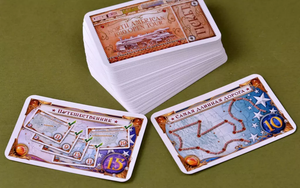 Расширение для настольной игры Ticket to Ride: Америка 1910 от Sovabooks, изображение коробки и игрового поля