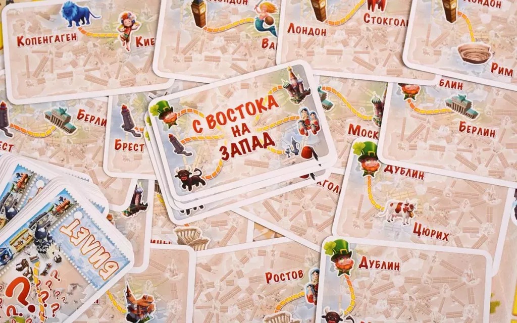 Детская настольная игра Ticket to Ride Junior Европа от SOVABOOKS, изображена коробка с игрой и игровыми компонентами