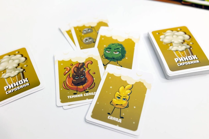 Настольная игра ПивоWars UKR от SOVABOOKS для вечеринок и развлечений, изображение коробки и игры на столе